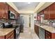 Well-equipped kitchen featuring stainless steel appliances, granite countertops, and ample cabinet space, great for culinary enthusiasts at 7616 Southwick St, Orlando, FL 32818