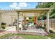 Covered outdoor seating area featuring comfortable furniture, perfect for relaxation and entertaining guests at 811 Wayne Ave, Altamonte Springs, FL 32701