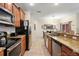 Well-equipped kitchen with granite countertops and stainless steel appliances at 8941 Bismarck Palm Rd, Kissimmee, FL 34747