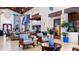Lobby area offering seating, a view of the entrance, and access to the game room at 8941 Bismarck Palm Rd, Kissimmee, FL 34747
