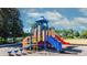 Community playground features colorful equipment including slides and climbing structures, perfect for Gathering fun at 8941 Bismarck Palm Rd, Kissimmee, FL 34747