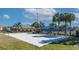 Community sand volleyball court, perfect for enjoying outdoor recreation and socializing in a tropical setting at 8941 Bismarck Palm Rd, Kissimmee, FL 34747