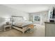 Spacious main bedroom with ensuite bath and sitting area at 10161 Sandy Marsh Ln, Orlando, FL 32832