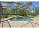 Beautiful pool and spa with a screened enclosure and well-maintained brick patio at 10161 Sandy Marsh Ln, Orlando, FL 32832