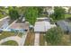 An aerial view of the home showcases a well-maintained yard with a shed at 1094 Henry Balch Dr, Orlando, FL 32810