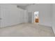 Large bedroom with carpet flooring, ensuite bathroom, and multiple closets at 1150 Vineland Pl, Lake Mary, FL 32746