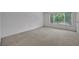 Large bedroom with carpet flooring, natural light, and a closet at 1150 Vineland Pl, Lake Mary, FL 32746