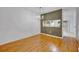 Elegant dining room with hardwood floors, chandelier, and a view of the kitchen at 1150 Vineland Pl, Lake Mary, FL 32746