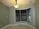 Cozy dining area with bay windows at 11540 Sandy Hill Dr, Orlando, FL 32821