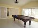 The large game room has a billiard table and plenty of room for recreation at 11540 Sandy Hill Dr, Orlando, FL 32821
