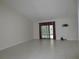 Bright living room with sliding door leading to outdoors at 11540 Sandy Hill Dr, Orlando, FL 32821