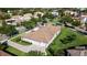 A beautiful suburban home and neighborhood showcasing a well-maintained yard and three-car garage at 11706 Waterstone Loop Dr, Windermere, FL 34786