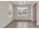 Cozy dining area with natural light and wood-style tile flooring at 11807 Charades St, Orlando, FL 32832