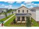 Charming two-story home with manicured lawn and curb appeal at 11807 Charades St, Orlando, FL 32832