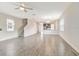 Spacious living room with tile flooring and staircase access at 11807 Charades St, Orlando, FL 32832