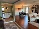 Open-concept living room and dining area with modern decor and plenty of natural light at 1203 Monterey Dr, Eustis, FL 32726