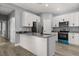Modern kitchen with stainless steel appliances and gray countertop at 1203 W 16Th St, Sanford, FL 32771