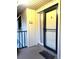 Front door entrance with a glass door and a unit number 3D at 130 Jasmine Woods Ct # 3D, Deltona, FL 32725