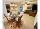 Open-concept space including the kitchen, dining area, and comfortable seating at 130 Jasmine Woods Ct # 3D, Deltona, FL 32725