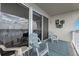 Inviting balcony adorned with stylish decor and offering picturesque views of the surrounding area at 13427 Blue Heron Beach Dr # 1907, Orlando, FL 32821