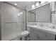 Modern bathroom with a glass-enclosed shower and vanity at 13427 Blue Heron Beach Dr # 1907, Orlando, FL 32821