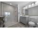 Beautiful bathroom boasting a sleek glass-enclosed shower and elegant vanity at 13427 Blue Heron Beach Dr # 1907, Orlando, FL 32821