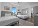 Bright bedroom with two beds, natural light, and a closet at 13427 Blue Heron Beach Dr # 1907, Orlando, FL 32821