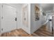 Entryway featuring a door, a mirror and art at 13427 Blue Heron Beach Dr # 1907, Orlando, FL 32821