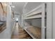 Hallway featuring art and lighting with a bunk bed on the right at 13427 Blue Heron Beach Dr # 1907, Orlando, FL 32821
