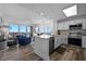 Open-concept kitchen blends seamlessly with the living area, offering waterfront views and modern amenities for easy entertaining at 13427 Blue Heron Beach Dr # 1907, Orlando, FL 32821