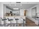 Kitchen with granite countertops, an island bar, and stainless-steel appliances at 13427 Blue Heron Beach Dr # 1907, Orlando, FL 32821