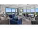 Cozy living room with a beautiful view, comfortable seating and modern furnishings at 13427 Blue Heron Beach Dr # 1907, Orlando, FL 32821