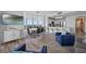 Inviting living area with a modern kitchen, dining area and a comfortable seating arrangement at 13427 Blue Heron Beach Dr # 1907, Orlando, FL 32821