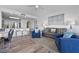 Open-concept living area, connecting a modern kitchen and stylish lounge area at 13427 Blue Heron Beach Dr # 1907, Orlando, FL 32821