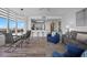 Bright living room featuring modern decor and a view of the city skyline at 13427 Blue Heron Beach Dr # 1907, Orlando, FL 32821