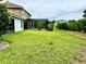 Expansive backyard with lush green grass and space for outdoor activities at 1474 Lake Side Ave, Davenport, FL 33837