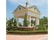 Grand entrance to Providence neighborhood with manicured landscaping at 1474 Lake Side Ave, Davenport, FL 33837