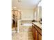 Luxurious bathroom featuring a separate shower and soaking tub, with elegant tile work at 1474 Lake Side Ave, Davenport, FL 33837
