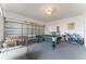 Finished garage area featuring a pool table and foosball table for fun and entertainment at 149 Emeraldview Ave, Davenport, FL 33897