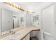 Bathroom featuring neutral carpet and lots of counter space, storage, and a toilet at 171 Seabreeze Cir, Kissimmee, FL 34743