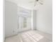 Bright bedroom with vaulted ceiling, ceiling fan, and window that lets in lots of natural light at 171 Seabreeze Cir, Kissimmee, FL 34743