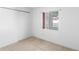 Bedroom with a window and closet space at 171 Seabreeze Cir, Kissimmee, FL 34743