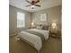 Staged bedroom showcases a cozy layout, soft lighting, and comfortable decor at 1726 Brassie Ct, Kissimmee, FL 34746