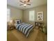 Stylized ' bedroom with a striped bed, playful decor, and ample natural light at 1726 Brassie Ct, Kissimmee, FL 34746