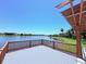 Waterfront deck offering stunning views of the serene lake at 1726 Brassie Ct, Kissimmee, FL 34746