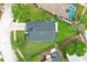 Overhead view of the property showing the backyard, landscaping, and the surrounding neighborhood layout at 1825 Needham Rd, Apopka, FL 32712