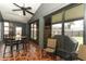 Enjoy the covered lanai with tiled floors for outdoor entertaining at 1825 Needham Rd, Apopka, FL 32712