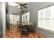 Relax in the screened-in patio with tile floors and natural light at 1825 Needham Rd, Apopka, FL 32712