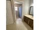 The bathroom offers a tile floor, updated vanity, and shower-tub combo at 1880 N Crystal Lake Dr # 3, Lakeland, FL 33801