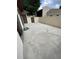 An outdoor patio featuring a large concrete area surrounded by privacy walls at 1880 N Crystal Lake Dr # 3, Lakeland, FL 33801
